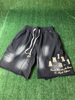 AMIRI Black Shorts with Cream Graphic Lettering